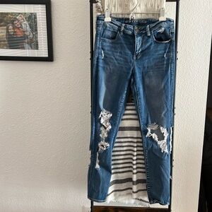 Size 10 American Eagle distressed skinny jeans 3 pairs.